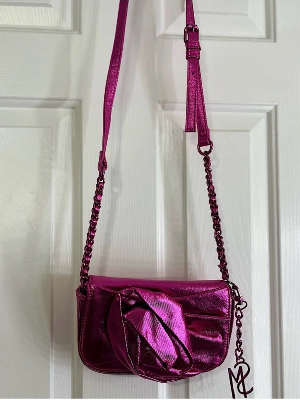 Steve Madden Metallic Fuchsia Crossbody Bag with flower Detail